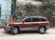 Hyundai Santa Fe Tubo 2.0 AT 2004 - Bán Hyundai Santa Fe Tubo 2.0 AT sản xuất 2004, màu nâu, nhập khẩu số tự động giá 210 triệu tại Cao Bằng