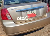 Daewoo Lacetti EX 2004 - Bán Daewoo Lacetti EX đời 2004, màu vàng, nhập khẩu giá 120 triệu tại Đắk Lắk