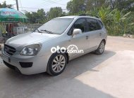 Kia Carens MT 2010 - Xe Kia Carens MT năm sản xuất 2010, màu bạc giá 195 triệu tại Tp.HCM