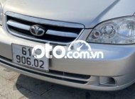 Daewoo Lacetti SE 2009 - Cần bán Daewoo Lacetti SE sản xuất năm 2009, màu bạc giá 155 triệu tại Bình Dương