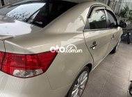 Kia Forte 2011 - Cần bán Kia Forte 1.6AT năm 2011, màu vàng chính chủ giá 325 triệu tại TT - Huế