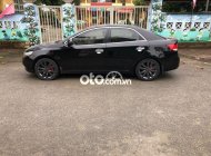 Kia Forte 2011 - Cần bán xe Kia Forte SX 2.4 AT năm 2011, màu đen  giá 320 triệu tại Lào Cai