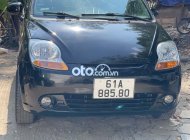 Chevrolet Spark MT 2010 - Cần bán gấp Chevrolet Spark MT sản xuất năm 2010, màu đen giá 98 triệu tại Tp.HCM