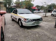 Mazda 323 1997 - Bán ô tô Mazda 323 2.0MT sản xuất 1997, màu trắng, nhập khẩu giá 33 triệu tại Nghệ An