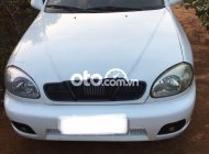 Daewoo Lanos MT 2001 - Cần bán gấp Daewoo Lanos MT sản xuất năm 2001, màu trắng, giá tốt giá 65 triệu tại Gia Lai