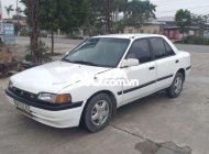 Mazda 323 1995 - Cần bán xe Mazda 323 2.0MT sản xuất năm 1995, màu trắng, nhập khẩu giá 29 triệu tại Nam Định