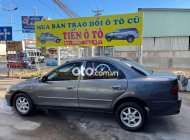 Mazda 323  GLX 1998 - Cần bán gấp Mazda 323 GLX năm sản xuất 1998, màu xám, giá chỉ 60 triệu giá 60 triệu tại Tiền Giang