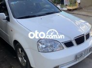 Daewoo Lacetti   SE 2004 - Bán Daewoo Lacetti SE năm 2004, màu trắng giá 120 triệu tại Bình Dương