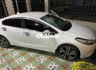 Kia Cerato 1.6MT 2018 - Bán ô tô Kia Cerato 1.6MT sản xuất 2018, màu trắng chính chủ giá 390 triệu tại Bình Thuận  