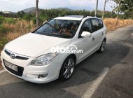 Hyundai i30 1.6AT 2009 - Cần bán gấp Hyundai i30 1.6AT sản xuất 2009, màu trắng, xe nhập, 290 triệu giá 290 triệu tại Tiền Giang