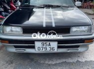 Toyota Corolla     1998 - Cần bán gấp Toyota Corolla sản xuất 1998, màu đen, xe nhập, giá tốt giá 59 triệu tại Hậu Giang