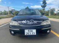 Ford Laser 1.6MT 2003 - Xe Ford Laser 1.6MT sản xuất 2003, màu đen chính chủ giá 140 triệu tại Bình Phước