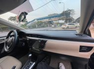 Toyota Corolla 2015 - Cần bán gấp Toyota Corolla 1.8G năm sản xuất 2015, màu đen, giá chỉ 543 triệu giá 543 triệu tại Hà Nội