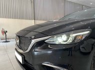 Cần bán lại xe Mazda 6 2.0L Luxury năm 2019, màu đen giá 720 triệu tại Tp.HCM