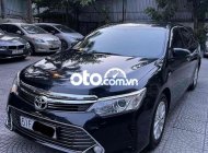 Xe Toyota Camry 2.0E năm sản xuất 2015, màu đen giá 700 triệu tại Tp.HCM