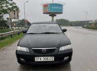 Mazda 626 2003 - Xe màu đen giá 135 triệu tại Hà Tĩnh