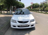 Mazda 323 2002 - Màu trắng giá 95 triệu tại Quảng Nam