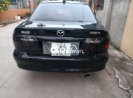 Mazda 626 2002 - Xe màu đen giá 105 triệu tại Quảng Ninh
