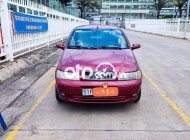 Fiat Albea 2006 -  màu đỏ, nhập khẩu nguyên chiếc còn mới giá 89 triệu tại Tp.HCM