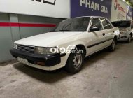 Toyota Corona 1990 - Màu trắng, nhập khẩu Nhật Bản giá hữu nghị giá 32 triệu tại Long An