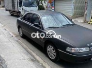 Mazda 626 1996 - Màu đen, chính chủ giá 88 triệu tại Tp.HCM