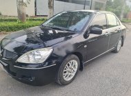 Mitsubishi Lancer 2002 - Màu đen xe gia đình, giá ưu đãi giá 168 triệu tại Đồng Tháp