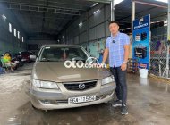 Mazda 626 2003 - Màu vàng, 135 triệu giá 135 triệu tại Tiền Giang