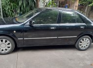 Ford Laser 2003 - Xe màu đen giá 130 triệu tại Phú Thọ