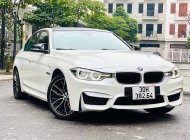 BMW 330i      2016 - Cần bán lại xe BMW 320i năm 2016, màu trắng, xe nhập, giá 955tr giá 955 triệu tại Hà Nội