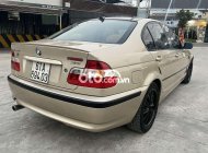 BMW 318i 2002 - Bán xe BMW 318i sản xuất năm 2002, màu vàng giá 150 triệu tại Tp.HCM