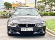 BMW 328i 2013 - Màu đen, nhập khẩu nguyên chiếc giá 719 triệu tại Tp.HCM