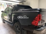 Toyota Hilux Bán xe  2.4E, màu đen, 1 cầu STĐ, ĐK T7/2021. 2021 - Bán xe Hilux 2.4E, màu đen, 1 cầu STĐ, ĐK T7/2021. giá 745 triệu tại Tuyên Quang
