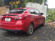 Mazda 2 2015 - Màu đỏ chính chủ giá 378 triệu tại Đắk Nông