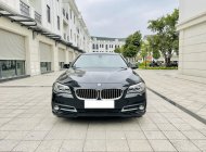 BMW 520i 2016 - Xe màu đen nội thất kem. Nhập khẩu nguyên chiếc giá 990 triệu tại Hà Nội