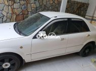 Ford Laser   2003 Ghia, số sàn, màu trắng 2003 - Ford laser 2003 Ghia, số sàn, màu trắng giá 107 triệu tại An Giang