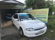 Ford Laser  lasr 1.6 phun xăng cực đẹp YouTube long xe cỏ 2001 - ford lasr 1.6 phun xăng cực đẹp YouTube long xe cỏ giá 95 triệu tại Vĩnh Long