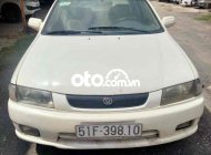 Mazda 323 cần bán lại xe tập lái   2001 - cần bán lại xe tập lái mazda 323 giá 60 triệu tại Tp.HCM