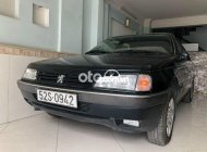 Peugeot 405  ,1992, màu xanh vỏ dưa 1992 - Peugeot 405,1992, màu xanh vỏ dưa giá 49 triệu tại Tp.HCM