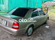 Mazda 323 Cần bán   2002 - Cần bán mazda 323 giá 8 triệu tại Bình Dương