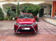 Toyota Corolla 1.3G 2015 - Gia đình cần bán chiếc xe ô tô Toyota Yarit 1.3G 2015 màu đỏ số tự động giá 325 triệu tại Hà Nội