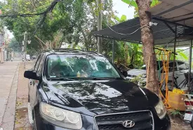 Hyundai Santa Fe 2009 - Chính chủ bán xe SANTAFE đăng ký 2009  máy  xăng 12 lít /100km, số tay giá 210 triệu tại Hà Nội