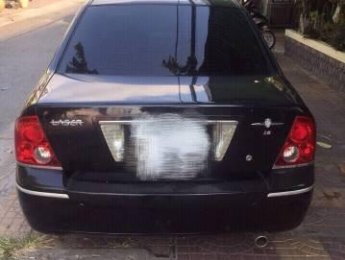 Ford Laser 2004 - Cần bán xe Ford Laser đời 2004, màu đen, giá tốt