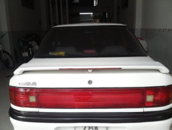 Mazda 323 1995 - Bán Mazda 323 đời 1995, màu trắng, nhập khẩu chính hãng