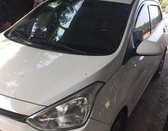 Hyundai i10 MT 2014 - Chính chủ bán Hyundai i10 MT đời 2014, màu trắng