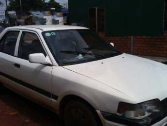 Mazda 323 MT 1995 - Bán xe Mazda 323 MT đời 1995, màu trắng chính chủ, giá chỉ 45 triệu