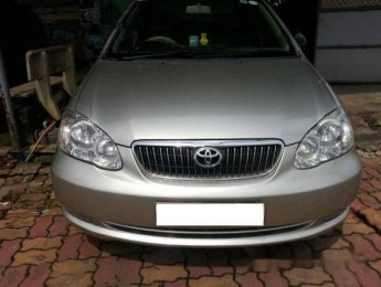 Toyota Corolla   MT 2006 - Bán ô tô Toyota Corolla MT năm 2006, màu bạc số sàn, giá 450tr