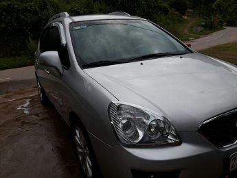 Kia Carens 2013 - Cần bán gấp Kia Carens năm 2013, màu bạc mới 95%, giá chỉ 525 triệu