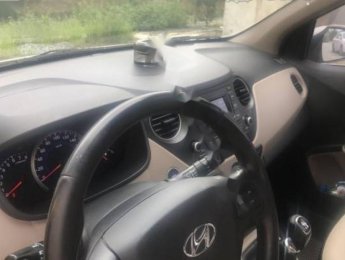 Hyundai i10 1.0 MT 2015 - Cần bán xe Hyundai i10 MT đời 2015, màu bạc, nhập khẩu số sàn