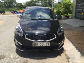 Kia Rondo   2014 - Bán Kia Rondo đời 2014, màu đen số tự động