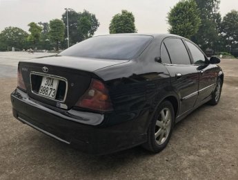 Daewoo Magnus 2004 - Bán Daewoo Magnus đời 2004, màu đen